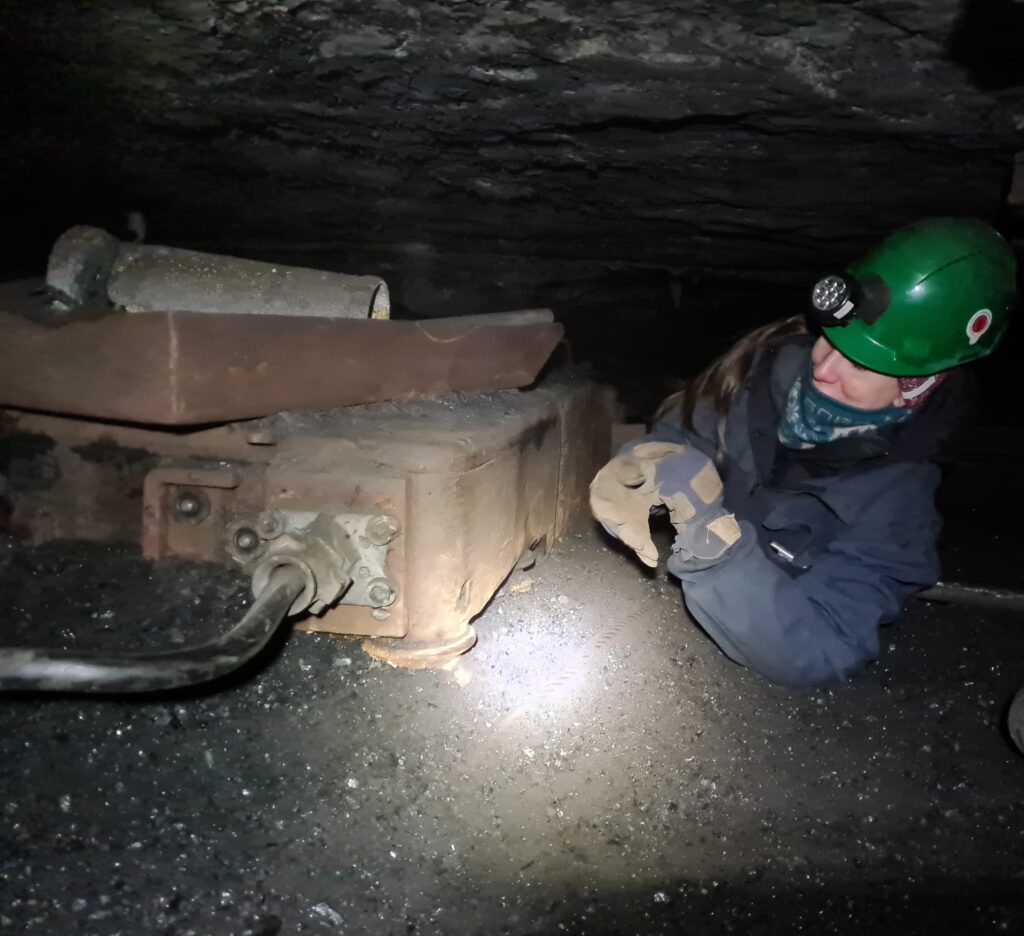 Crawling in the tunnels of Gruve 3, Longyearbyen, Svalbard, like miners used to do to extract coal from the mountain